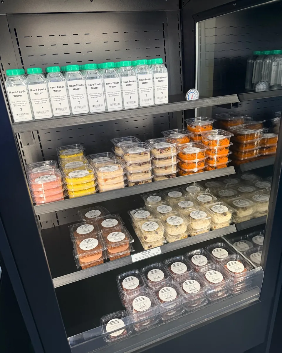 The Navo grab-and-go case stocked with drinks, sides and sweets